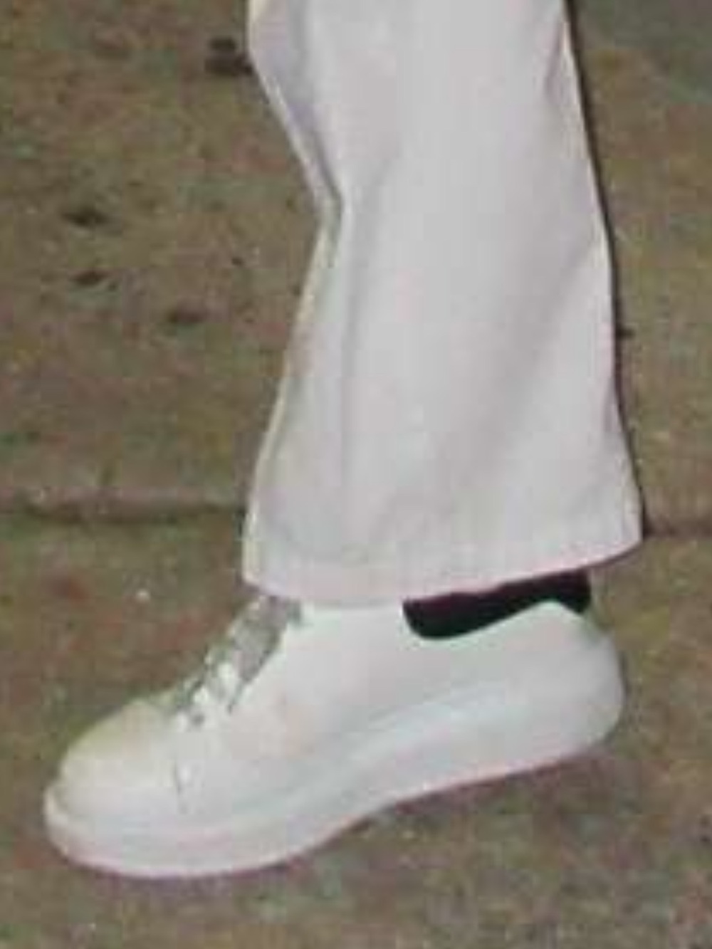 White Alexander Mcqueens. Real, worn but in good shape. White laces